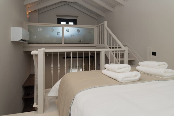 Imagen de la habitación del Ichos Apartments. Foto 1