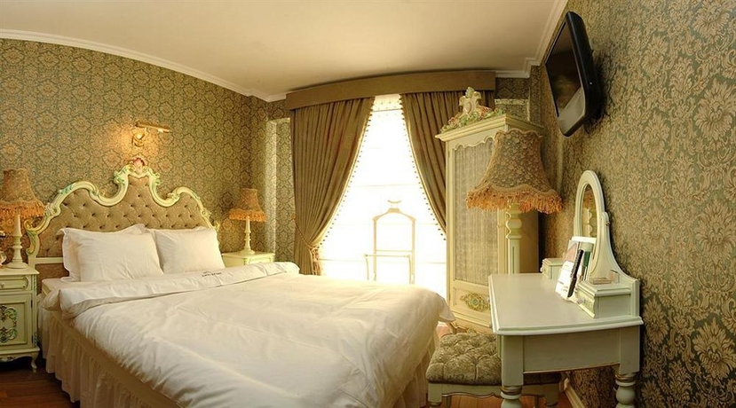 Imagen de la habitación del Idylle Hotel. Foto 7