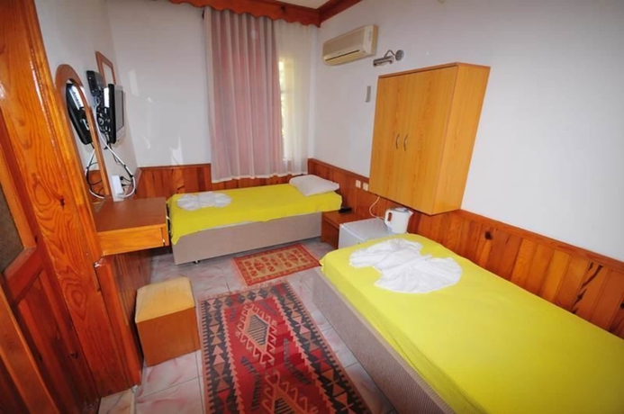 Imagen de la habitación del Ikiz Pansiyon Bungalow. Foto 13