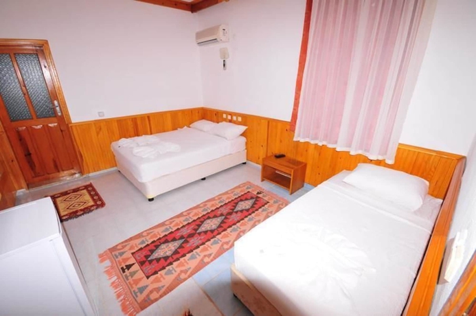 Imagen de la habitación del Ikiz Pansiyon Bungalow. Foto 14