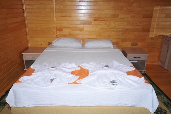 Imagen de la habitación del Ikiz Pansiyon Bungalow. Foto 16