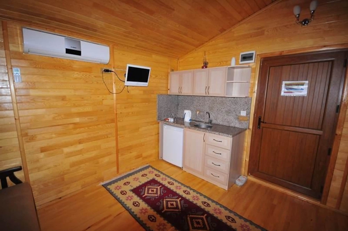 Imagen de la habitación del Ikiz Pansiyon Bungalow. Foto 17