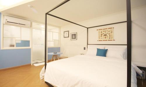 Imagen de la habitación del Iksan 4 Seasons Hotel. Foto 16