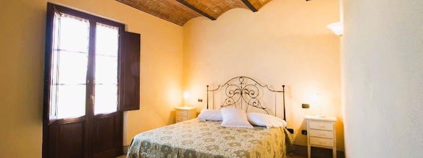 Imagen de la habitación del Il Casale di Donoratico con piscina. Foto 5