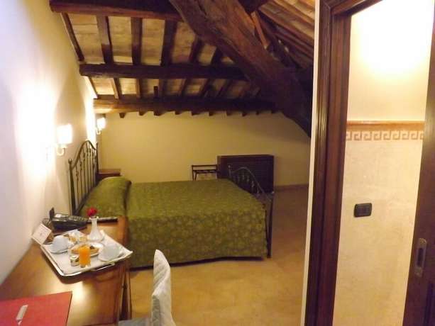 Imagen de la habitación del Il Postiglione Antica Posta Dei Chigi. Foto 4