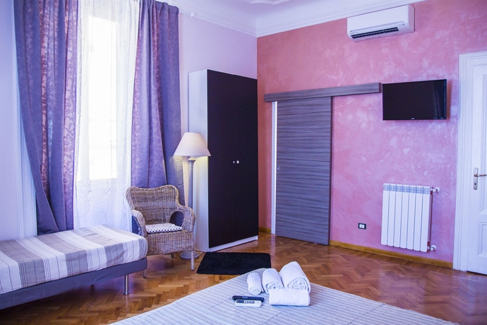 Imagen de la habitación del Il Sesto Suites Central. Foto 13