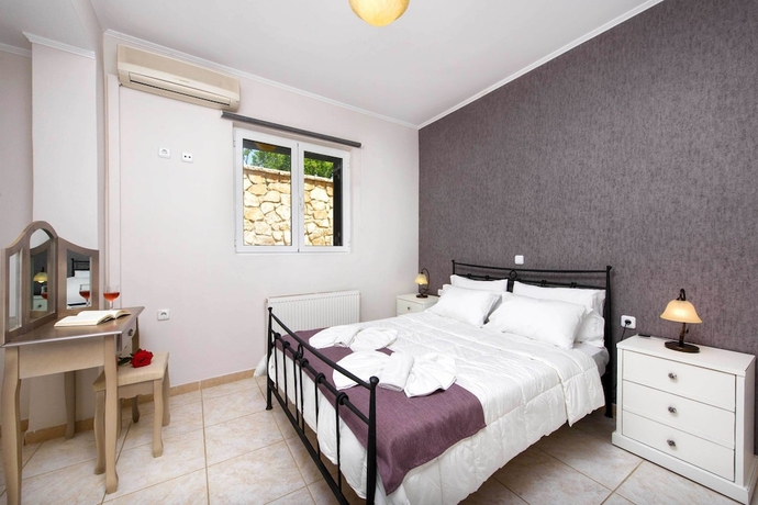 Imagen de la habitación del Il Tesori Dassia Villas. Foto 7