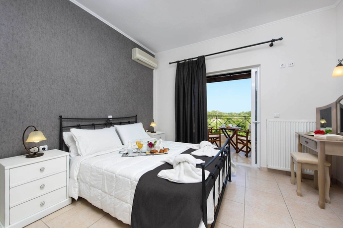 Imagen de la habitación del Il Tesori Dassia Villas. Foto 10