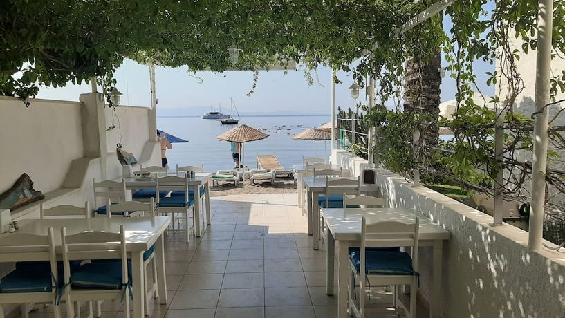 Imagen del bar/restaurante del Ilgin Hotel Ortakent. Foto 3