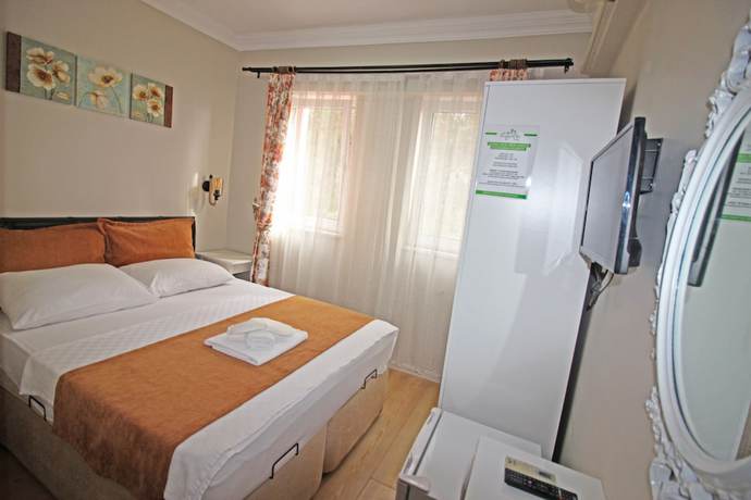 Imagen de la habitación del Ilyada Hotel. Foto 8