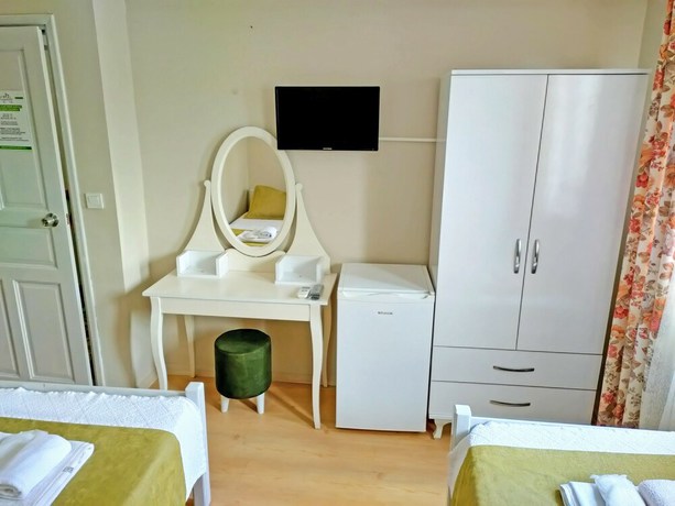Imagen de la habitación del Ilyada Hotel. Foto 9