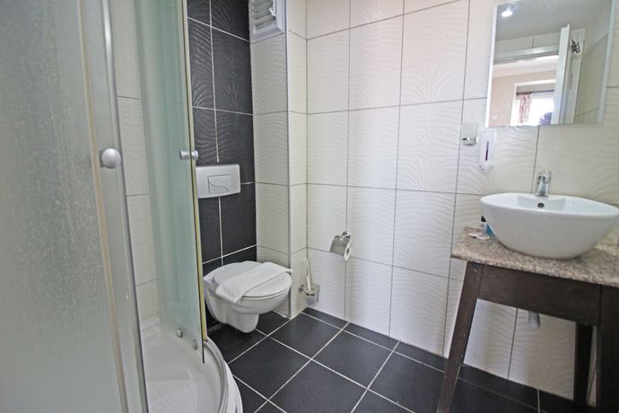 Imagen de la habitación del Ilyada Hotel. Foto 12