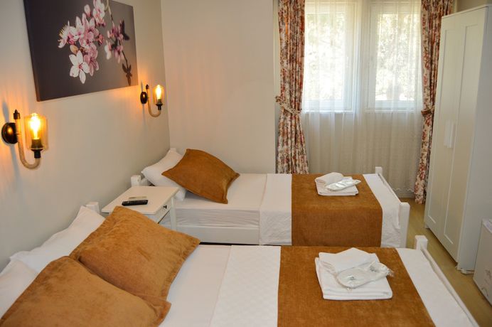 Imagen de la habitación del Ilyada Hotel. Foto 13