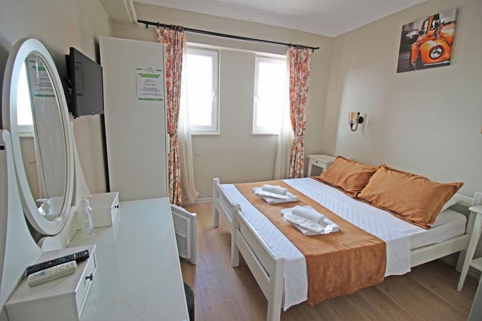 Imagen de la habitación del Ilyada Hotel. Foto 15