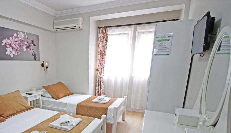 Imagen de la habitación del Ilyada Hotel. Foto 16