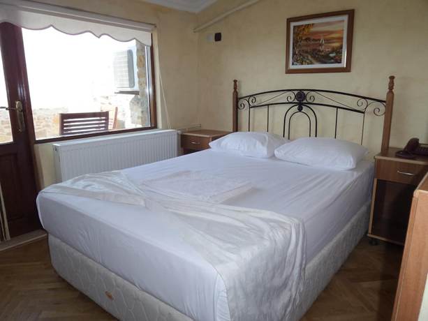 Imagen de la habitación del Imbros Hotel. Foto 4