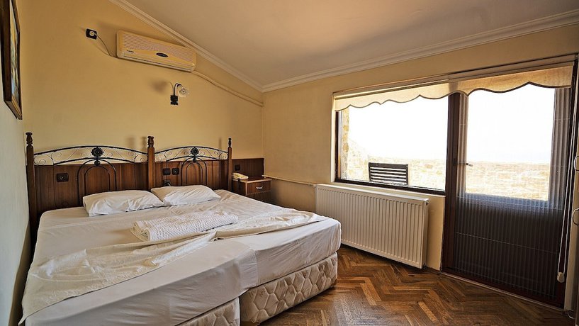 Imagen de la habitación del Imbros Hotel. Foto 18