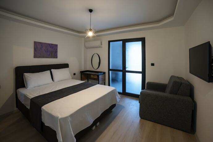 Imagen de la habitación del Imbrossa Hotel. Foto 13