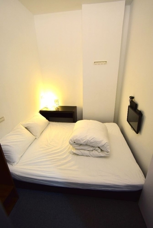 Imagen de la habitación del Inn Cube- Minquan. Foto 3