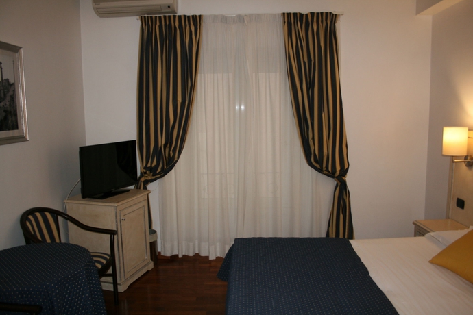 Imagen de la habitación del Inn Rome Rooms and Suites. Foto 1