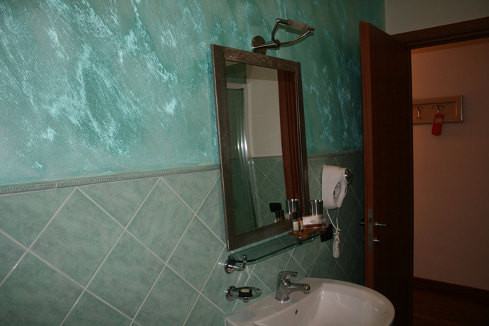 Imagen de la habitación del Inn Rome Rooms and Suites. Foto 16