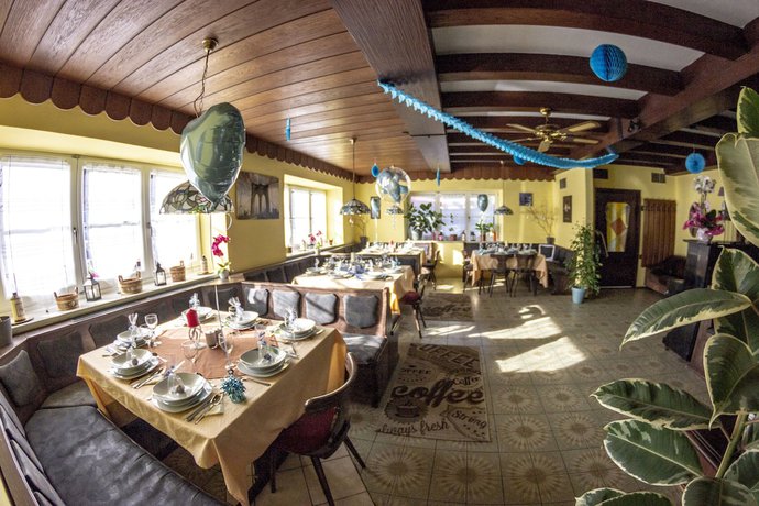 Imagen del bar/restaurante del Inntalhof Pension. Foto 6