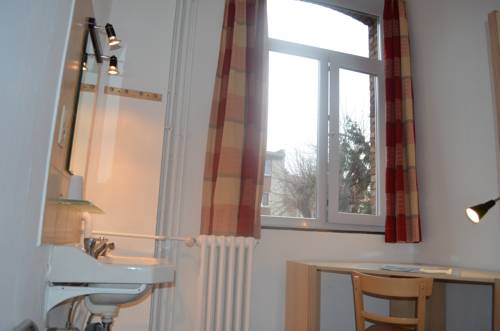 Imagen de la habitación del Institute Of Cultural Affairs. Foto 5