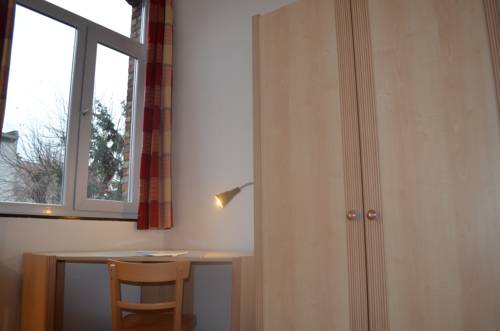 Imagen de la habitación del Institute Of Cultural Affairs. Foto 7