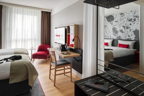 Imagen de la habitación del IntercityHotel Karlsruhe. Foto 12