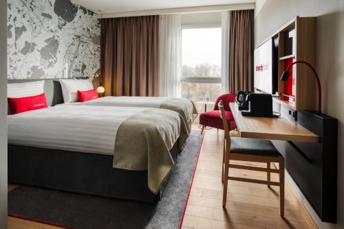 Imagen de la habitación del IntercityHotel Karlsruhe. Foto 14
