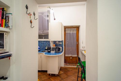 Imagen de la habitación del Intra' Residenza in Trastevere. Foto 16