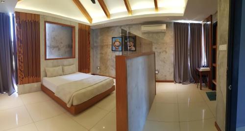Imagen de la habitación del Ipoh Santorini Hideaway - Hotel Inspired. Foto 18