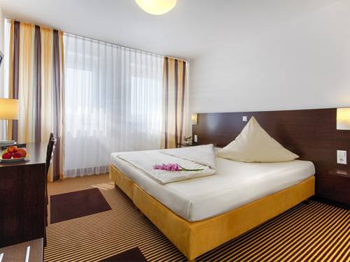 Imagen de la habitación del Iq Hotel, Langenau. Foto 13