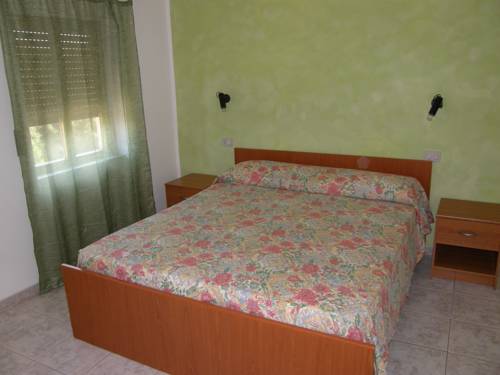 Imagen de la habitación del Isola Rossa Appartamenti Standard. Foto 9