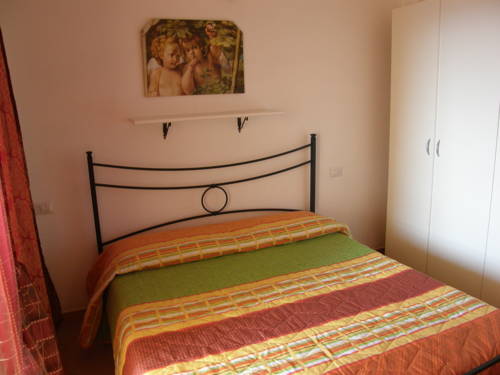 Imagen de la habitación del Isola Rossa Appartamenti Superior. Foto 8