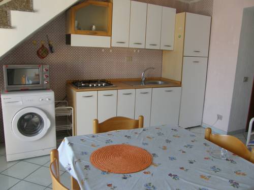 Imagen de la habitación del Isola Rossa Appartamenti Superior. Foto 9