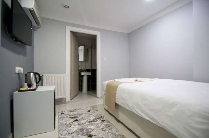 Imagen de la habitación del Istanbul Palace Hotel. Foto 17