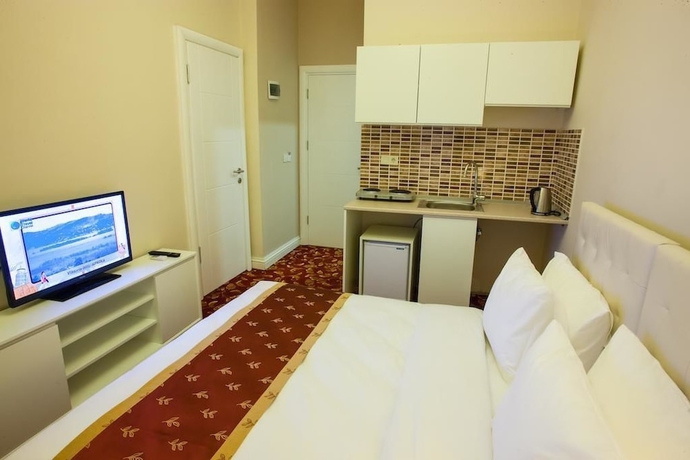 Imagen de la habitación del Istanburg Efes Hotel. Foto 9