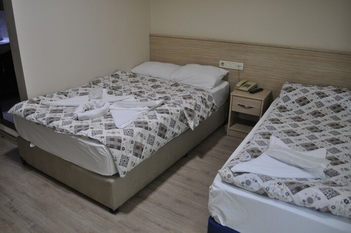Imagen de la habitación del Izmir Avsar Otel. Foto 17