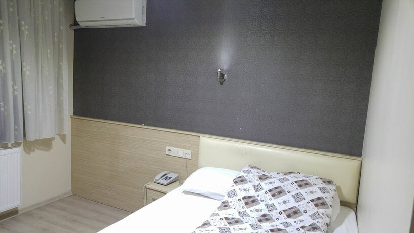 Imagen de la habitación del Izmir Avsar Otel. Foto 18