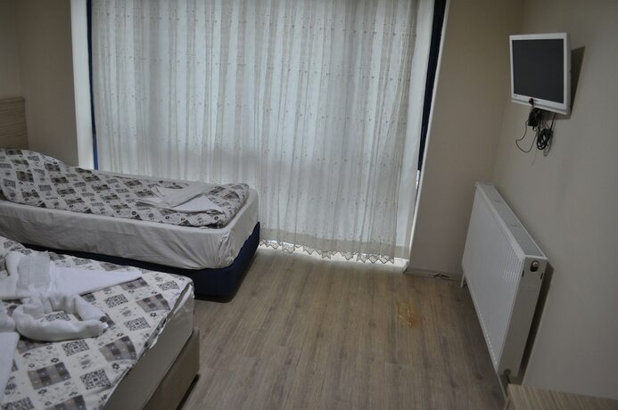 Imagen de la habitación del Izmir Avsar Otel. Foto 19