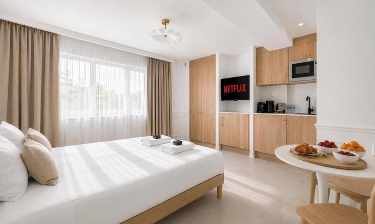 Imagen de la habitación del JIJI Suites. Foto 7