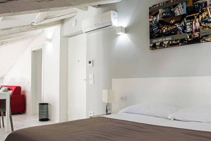 Imagen de la habitación del JOIVY Apartments - Trieste Goldoni. Foto 13