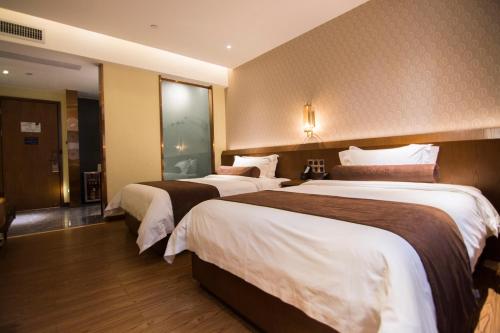 Imagen de la habitación del James Joyce Hotel Guangzhou Sanyuanli Subway Stati. Foto 6