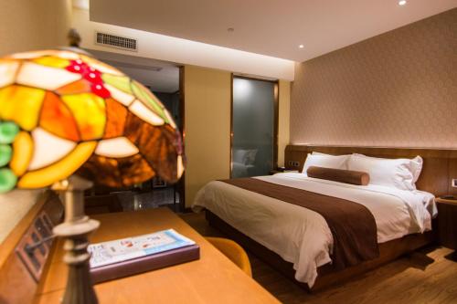 Imagen de la habitación del James Joyce Hotel Guangzhou Sanyuanli Subway Stati. Foto 7
