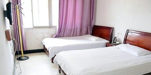 Imagen de la habitación del Jiangling Deyun Inn. Foto 2