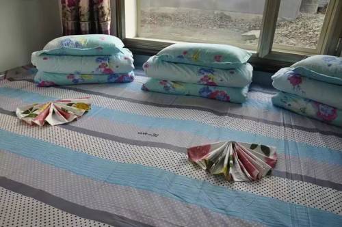 Imagen de la habitación del Jilin Wusong Island Songjuyuan Country House. Foto 2