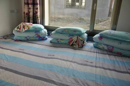 Imagen de la habitación del Jilin Wusong Island Songjuyuan Country House. Foto 5