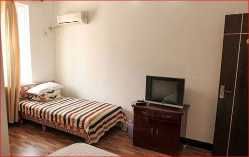 Imagen de la habitación del Jingzhou Sanxing Inn. Foto 5