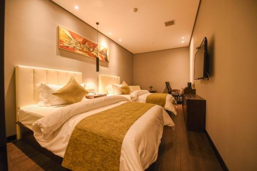Imagen de la habitación del Jinjiang Metropolo Hotels (Shanghai Hongqiao Airport Wuzhong Road Branch). Foto 6